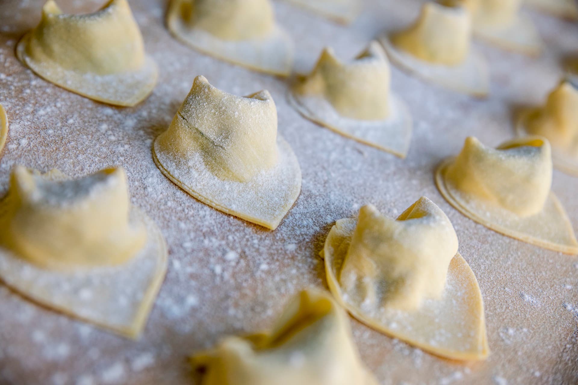 Handmade tortelloni dusted with semolina
